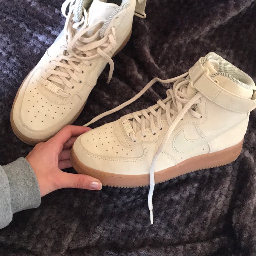Tan suede Nike Air Force shoes